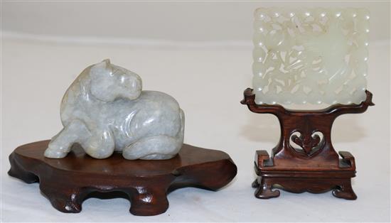 A Chinese pale celadon jade plaque, 18th / 19th century, 6.1cm, wood stand